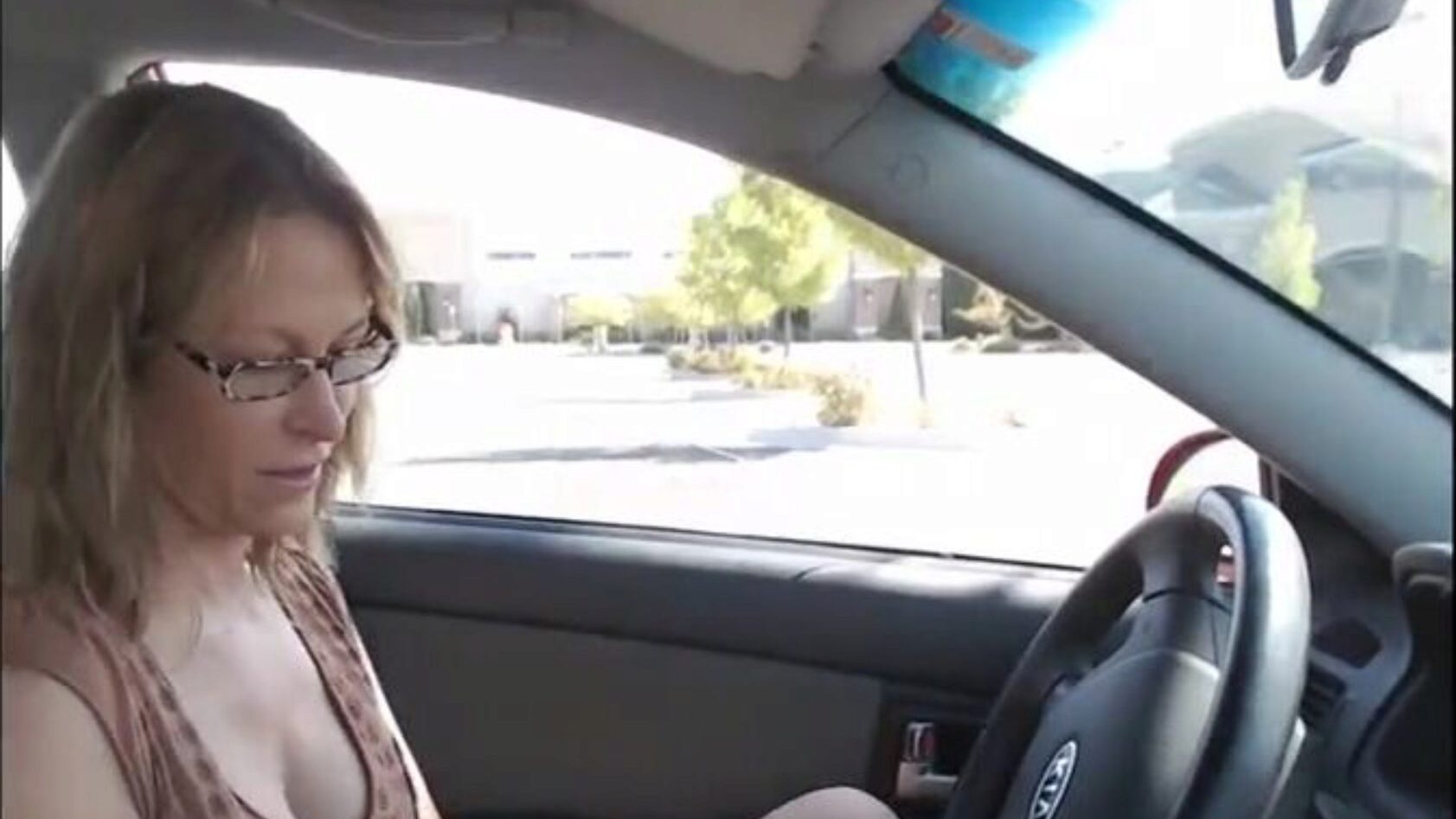 Excited Mamma Masturbates In Parked Car During The Time That Spouse Watches