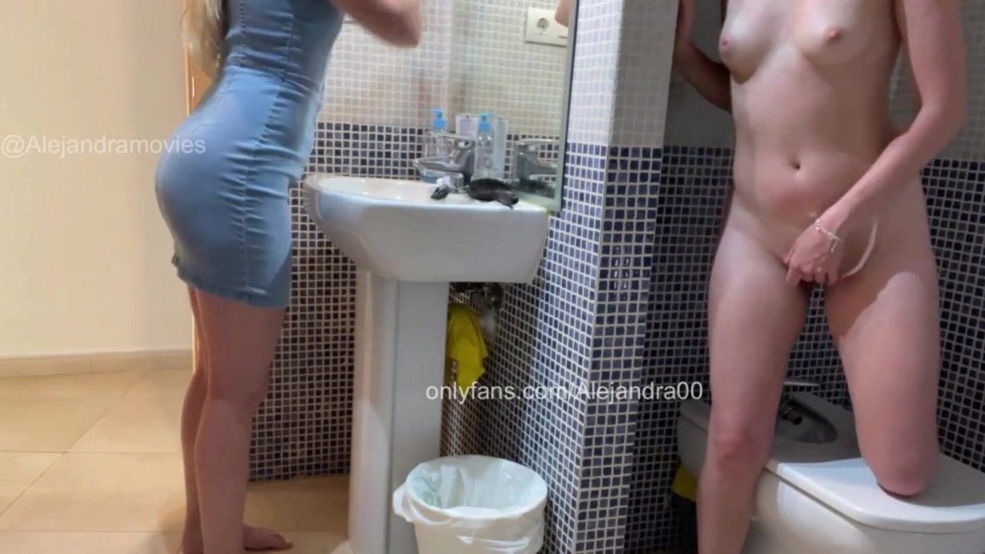 I'm masturbating in the bathroom and my sis comes in to look at herself in the mirror