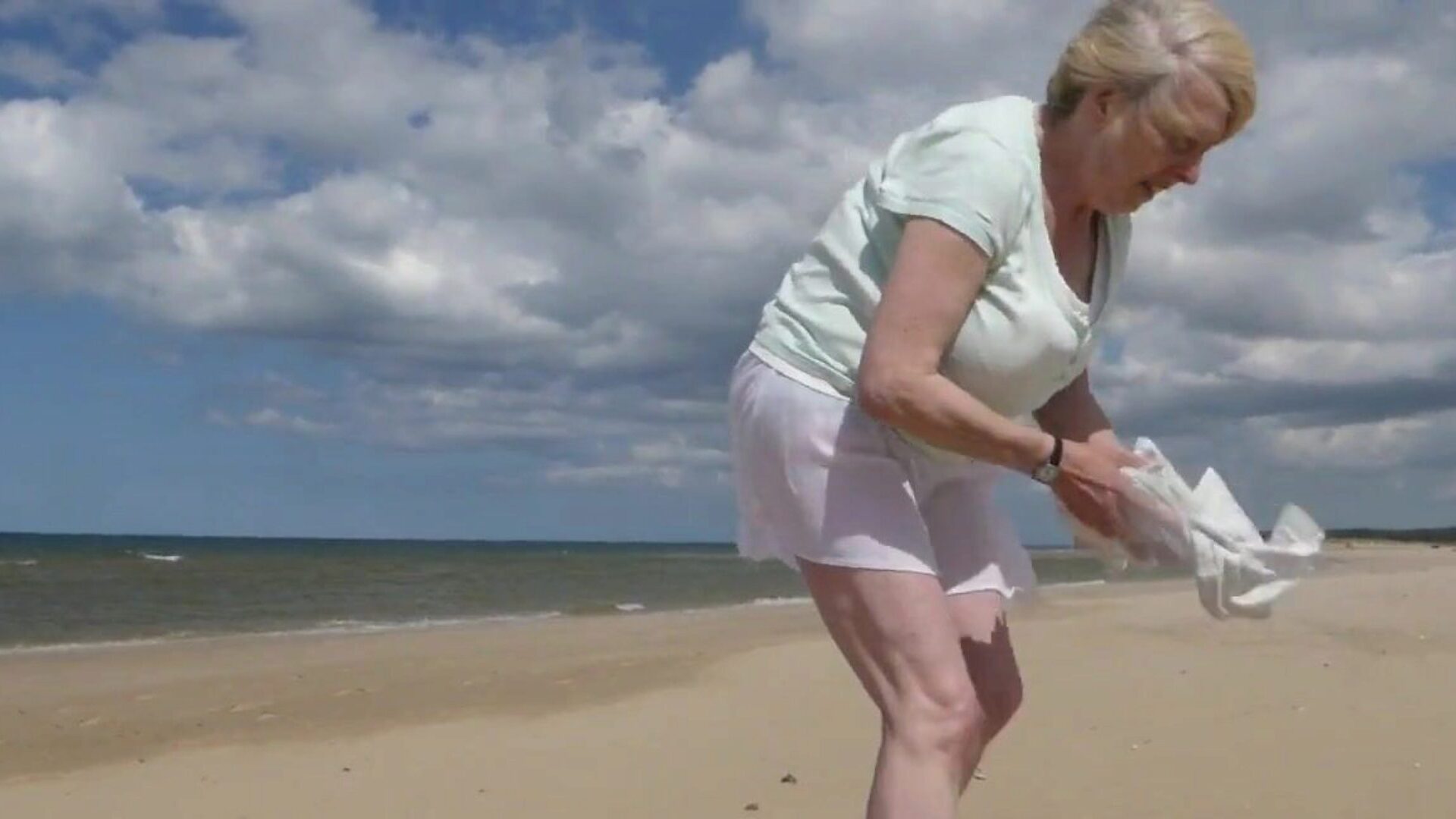 Wife ambling on beach Wife ambling bare on beach